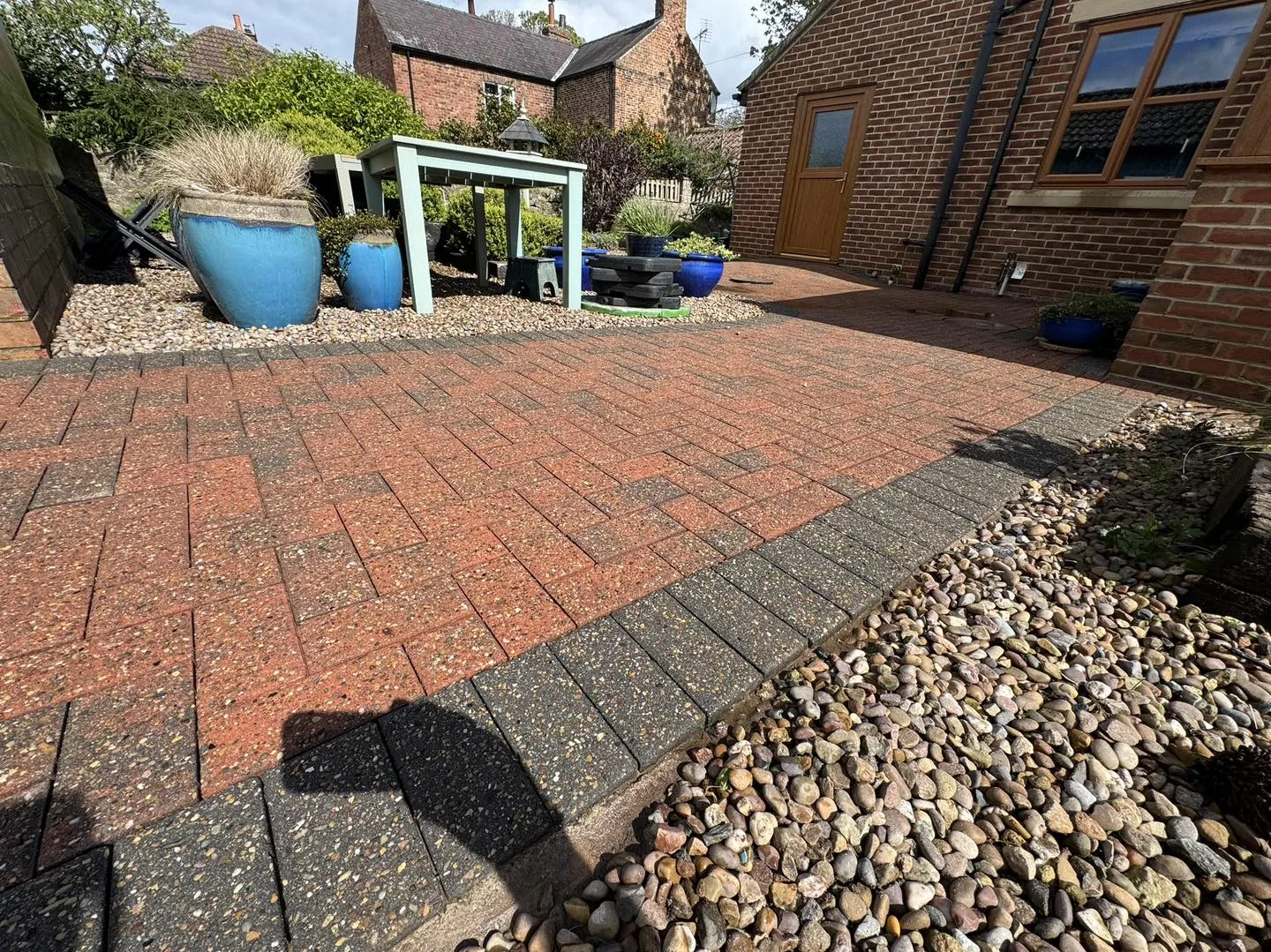 A clean brick patio in Thirsk after soft washing, the kind of slippery patio surface treated before autumn