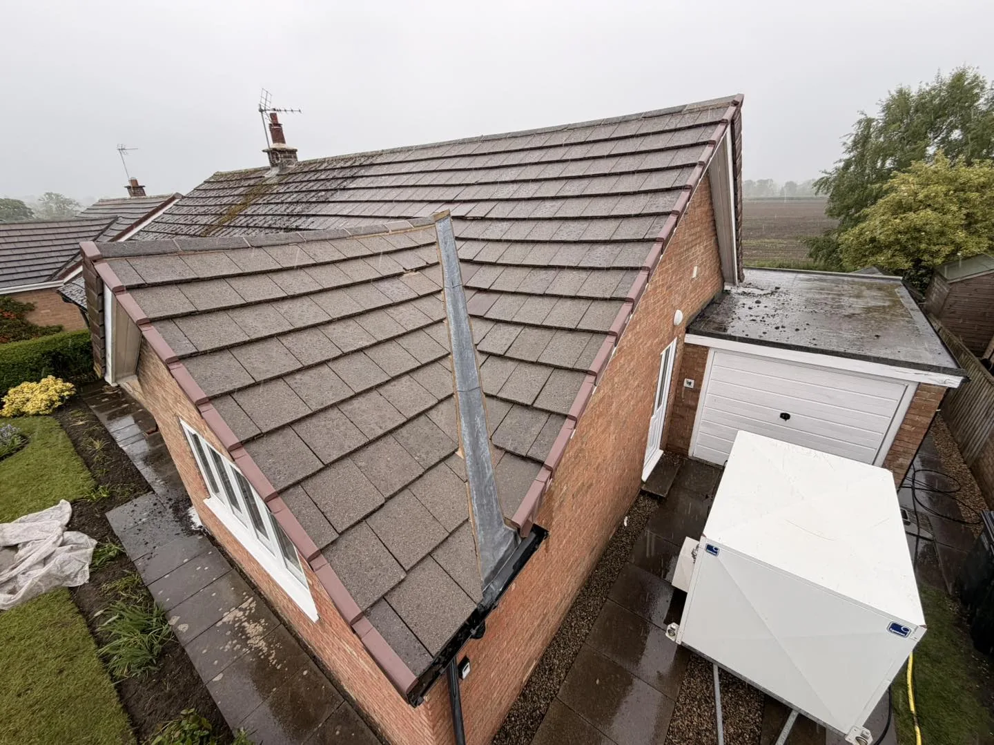 Roof tile moss clean before cleaning by Hopkins Exterior Cleaning